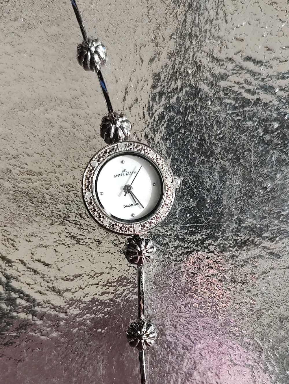 Anne Klein Silver-Tone Floral Bracelet Watch with Crystal Bezel